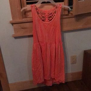 Pink high low with partial back showing